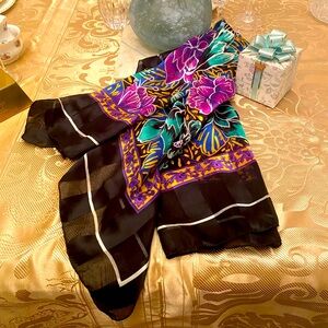 Black trimmed soft scarf with purple and teal flowers